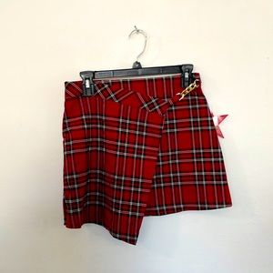 Hop into summer with this red, black,and white plaid skirt!